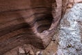 A small niche in rock wall on the bank of a shallow stream on the Wadi Numeira hiking trail in Jordan