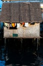 Small Nipa wooden House with close hanging out the