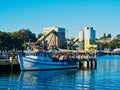 A Small Fishing Trawler and Industrial Buildings, Sydney Harbour, NSW, Australia