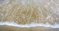 Small ocean sea waves on sandy beach in calm weather. Royalty Free Stock Photo