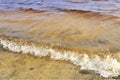 Small ocean waves splash near the coast Royalty Free Stock Photo