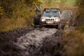 Small off road car stuck in deep mud Royalty Free Stock Photo