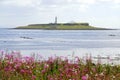 Small offshore island and lighthouse