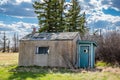 Small, old abandoned prairie farmhouse in Saskatchewan, Canada