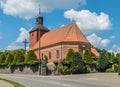 Small old baroque brick church in village of Stezyca, Poland. Royalty Free Stock Photo