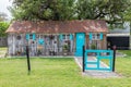 Small old building with a rusted metal roof in the Texas hill country