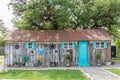 Small old building with a rusted metal roof in the Texas hill country