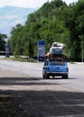 Small old car cargo overload Royalty Free Stock Photo