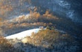 small old house on a hill in the snow Royalty Free Stock Photo