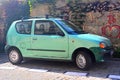 Small and old light green veteran Polish car Fiat Seicento private car parked Royalty Free Stock Photo