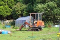 Small old mechanical digger. Royalty Free Stock Photo