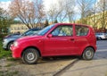 Small and old red Polish car Fiat Seicento private car parked Royalty Free Stock Photo