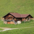 Small old timber hut in the Swiss Alps Royalty Free Stock Photo