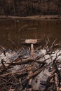 Small old wooden destroyed pier on the river Royalty Free Stock Photo