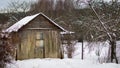 A small old wooden house in winter Royalty Free Stock Photo