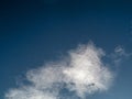 Small one engine air plane flying through clouds high in the sky Royalty Free Stock Photo