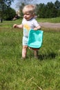 Small one year old boy child playing with toy truck car in the park Royalty Free Stock Photo