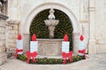 Small Onofrio Fountain decorated with Advent wreaths and candles in Dubrovnik