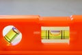 Small orange spirit level close up Royalty Free Stock Photo