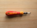 Small orange precision screwdriver