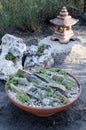 Small oriental garden for relaxing. The art of Japanese arrangement, with formal display according to strict rules Royalty Free Stock Photo