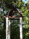 Small Orthodox chapel in sunlight in the forest Royalty Free Stock Photo