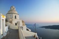 Small orthodox church with Greek flag at sunset,Santorini,Greece Royalty Free Stock Photo