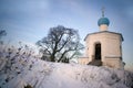 Small orthodox church on a snowed hill Royalty Free Stock Photo