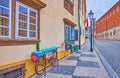 The small outdoor cafe in old town, Loretanska Street, Hradcany, on March 6 in Prague, Czech Republic Royalty Free Stock Photo