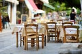 Small outdoor restaurants at the pedestrian area at center of Kalavryta town near the square and odontotos train station, Greece Royalty Free Stock Photo