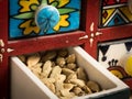 Small painted box with drawers for spices, open drawer Royalty Free Stock Photo