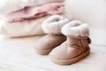 Small pair baby ugg on white background