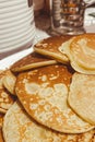 A small pancake, pancakes on a plate in the kitchen