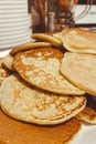 A small pancake, pancakes on a plate in the kitchen