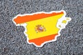 Small paper flag and map of Spain in poppy seed Royalty Free Stock Photo