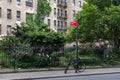 Small Park along a Street in Greenwich Village with an Old Apartment Building in New York City Royalty Free Stock Photo