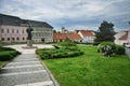 Small park on Pribinovo namestie square with statue of Pribina in Nitra town