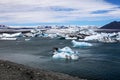 Small parts of melting iceberg in river. Ice drifting in Iceland. Global warming, Greenhouse effect Royalty Free Stock Photo