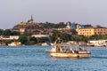 Small passenger ship crossing Tulcea harbor, Romania