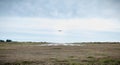 Small passenger plane taking off from an airfield on Yeu Island near France Royalty Free Stock Photo