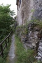 Small path with wooden handrail Royalty Free Stock Photo