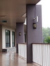 Small peaceful minimal resort hotel corridor way to rooms