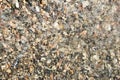 Small pebbles pebbles under the water surface photo background Royalty Free Stock Photo