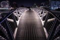 Small pedestrian bridge at night in False Creek, Vancouver.