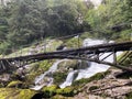 Small pedestrian bridges over the Giessbach stream and between the waterfalls Giessbach Falls / GiessbachfÃÂ¤lle or Giessbachfaelle