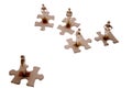 Small people on puzzle pieces Royalty Free Stock Photo