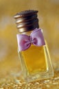 Small perfume with ribbon