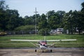 Small personal plane stop on runway at Ubon Ratchathani International Airport