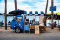 A small pickup truck converted into a coffee shop on the beach of Bangsaen, Thailand