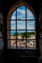 The small picturesque town Sirmione by the Lake Garda in Italy framed in a window Royalty Free Stock Photo